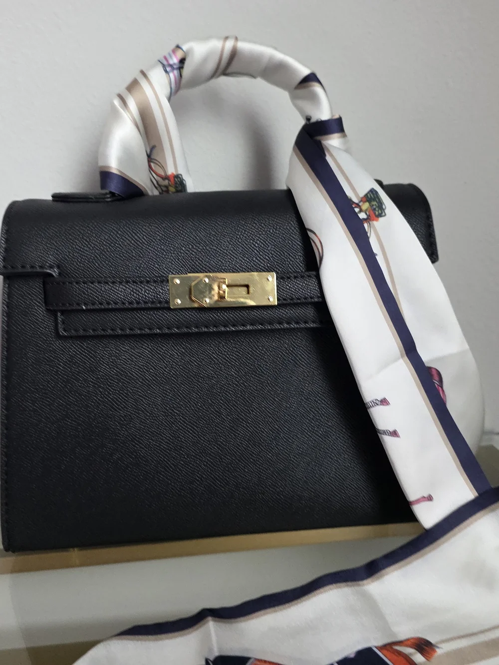 Black Leather Top-Handle Women's Bag with Gold Hardware